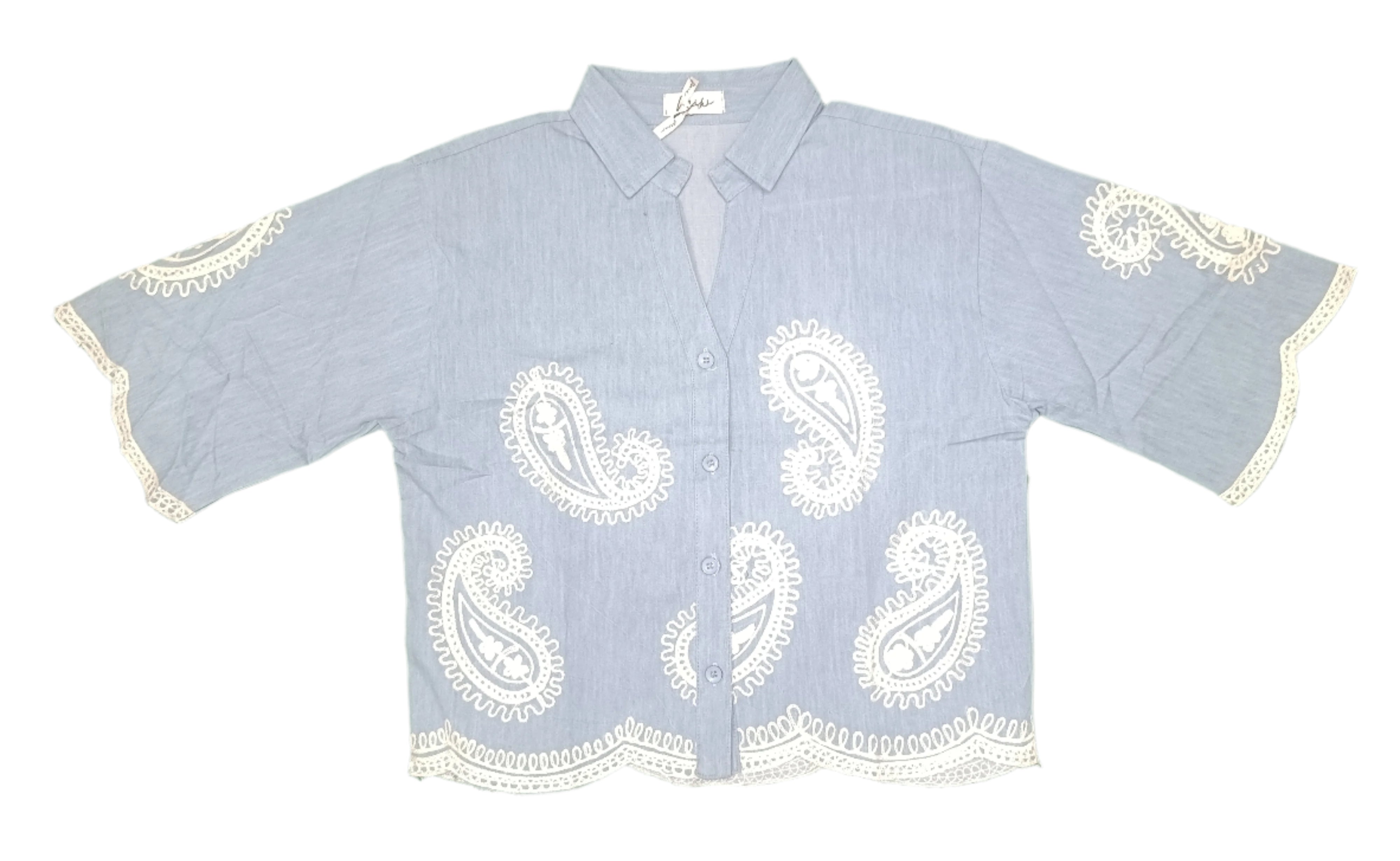 Women's button-up shirt showcases a relaxed fit