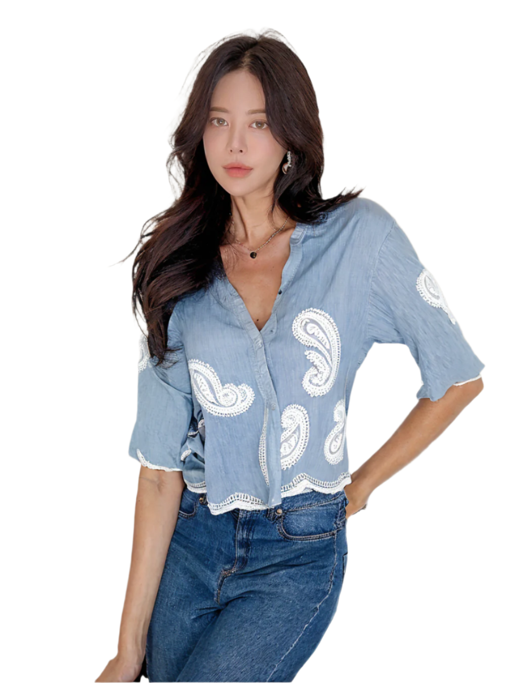 Women's button-up shirt showcases a relaxed fit